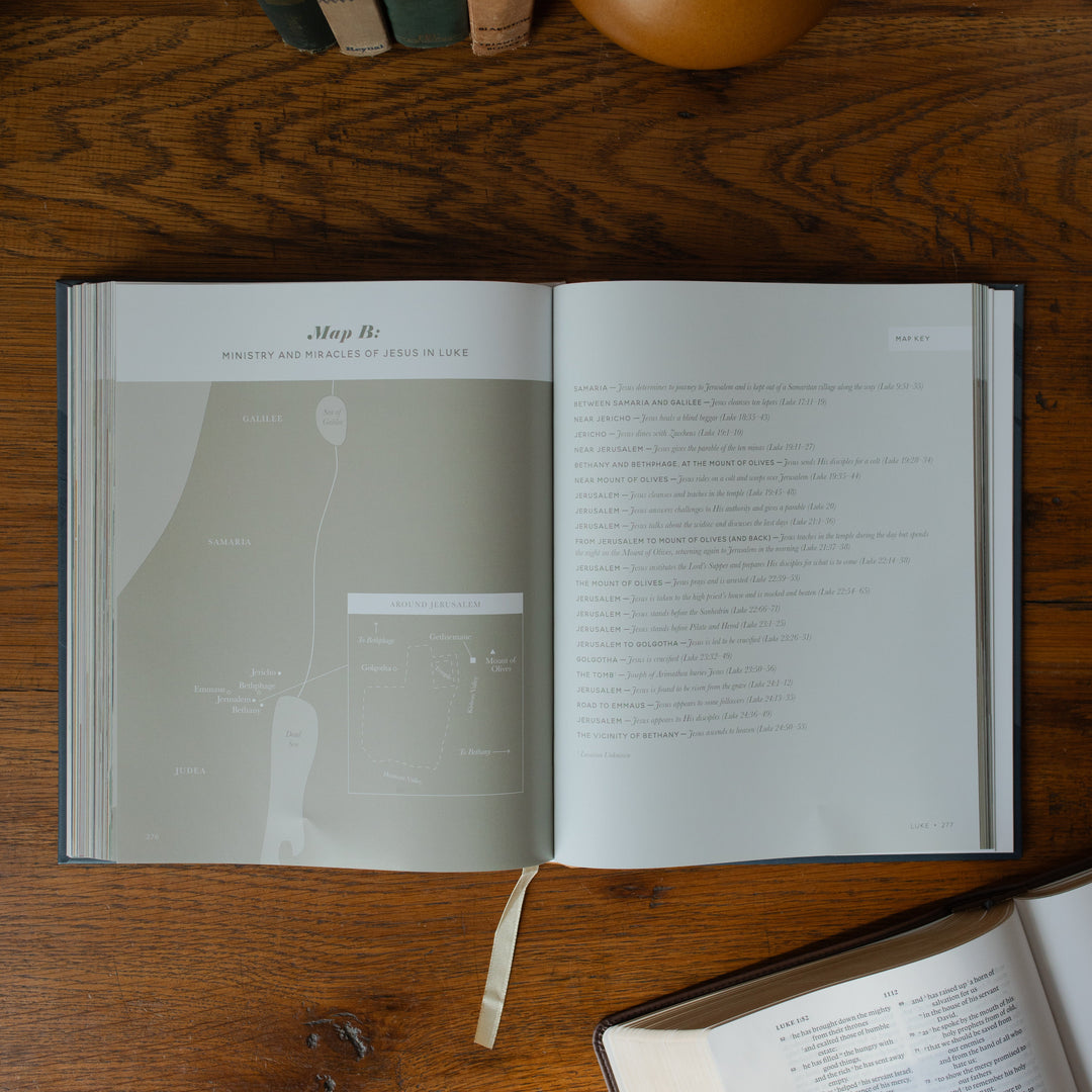 The Bible Maps Handbook opened to the Map B page on a wooden table near an open bible