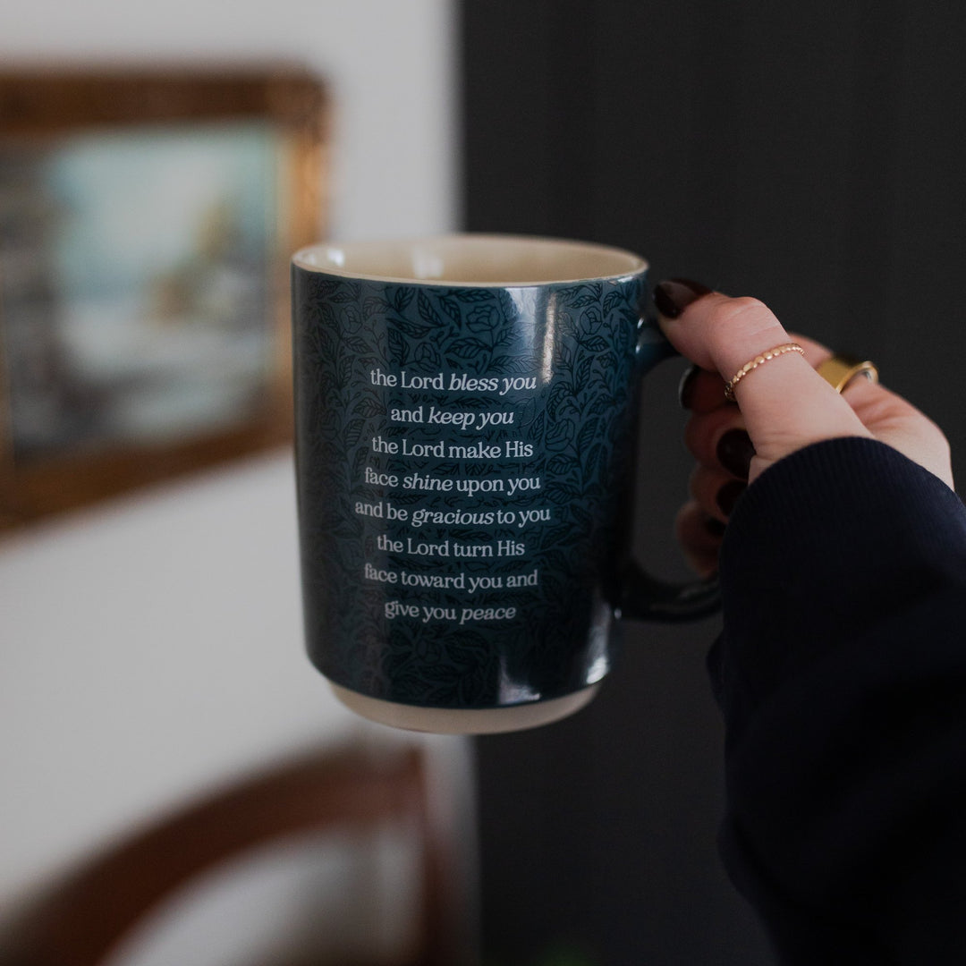 Blue floral mug with white lettering that has a blessing from the book of Numbers