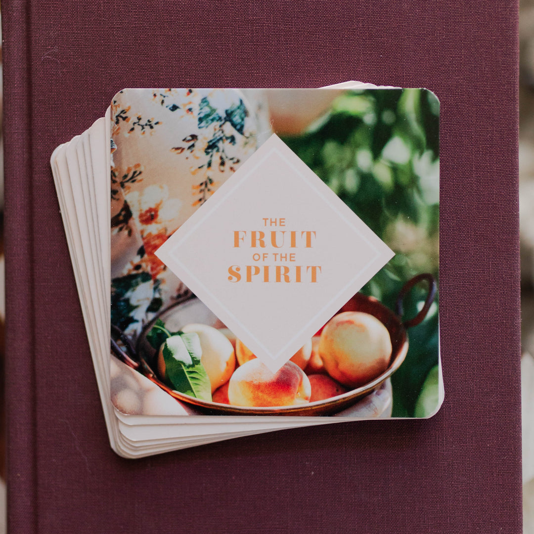 Fruit of the Spirit verse card set on top of a Bible