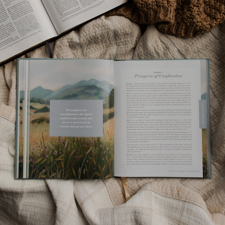 Prayer book and Bible on blanket