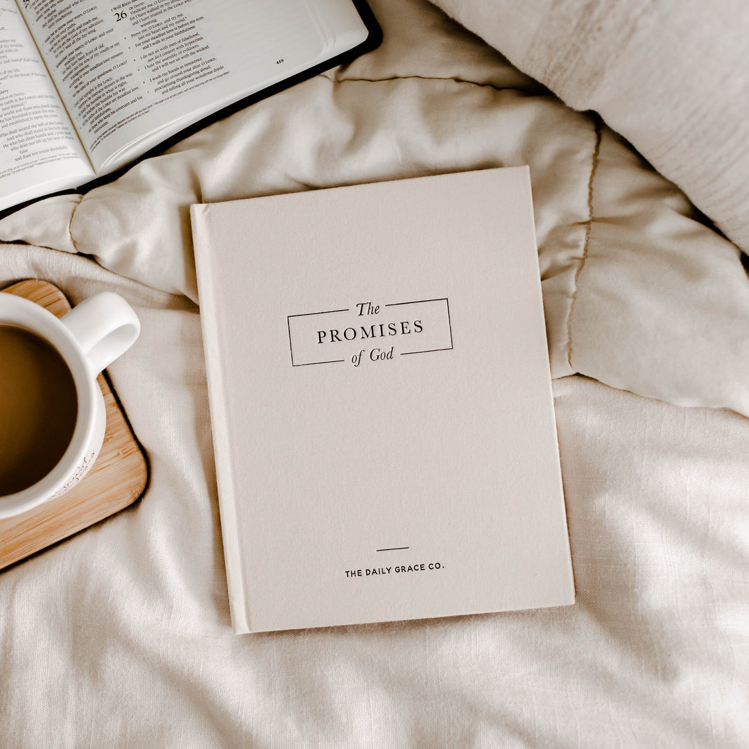 Book on the promises of God laying on a bed