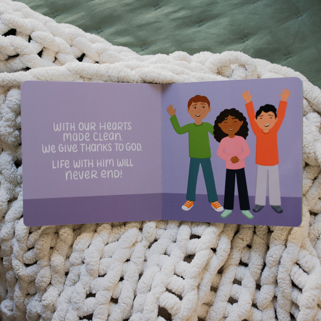 The Story of the Bible The Rescuer Arrives Book Opened to giving thanks to God page on a white knitted blanket on a green blanket