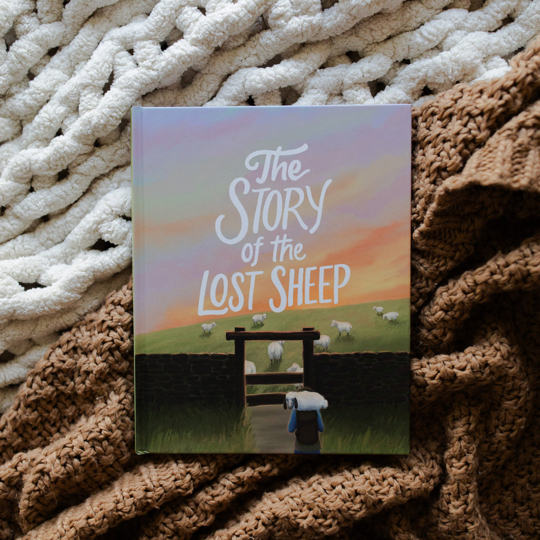 The Story of the Lost Sheep Book Cover laying on multiple blankets