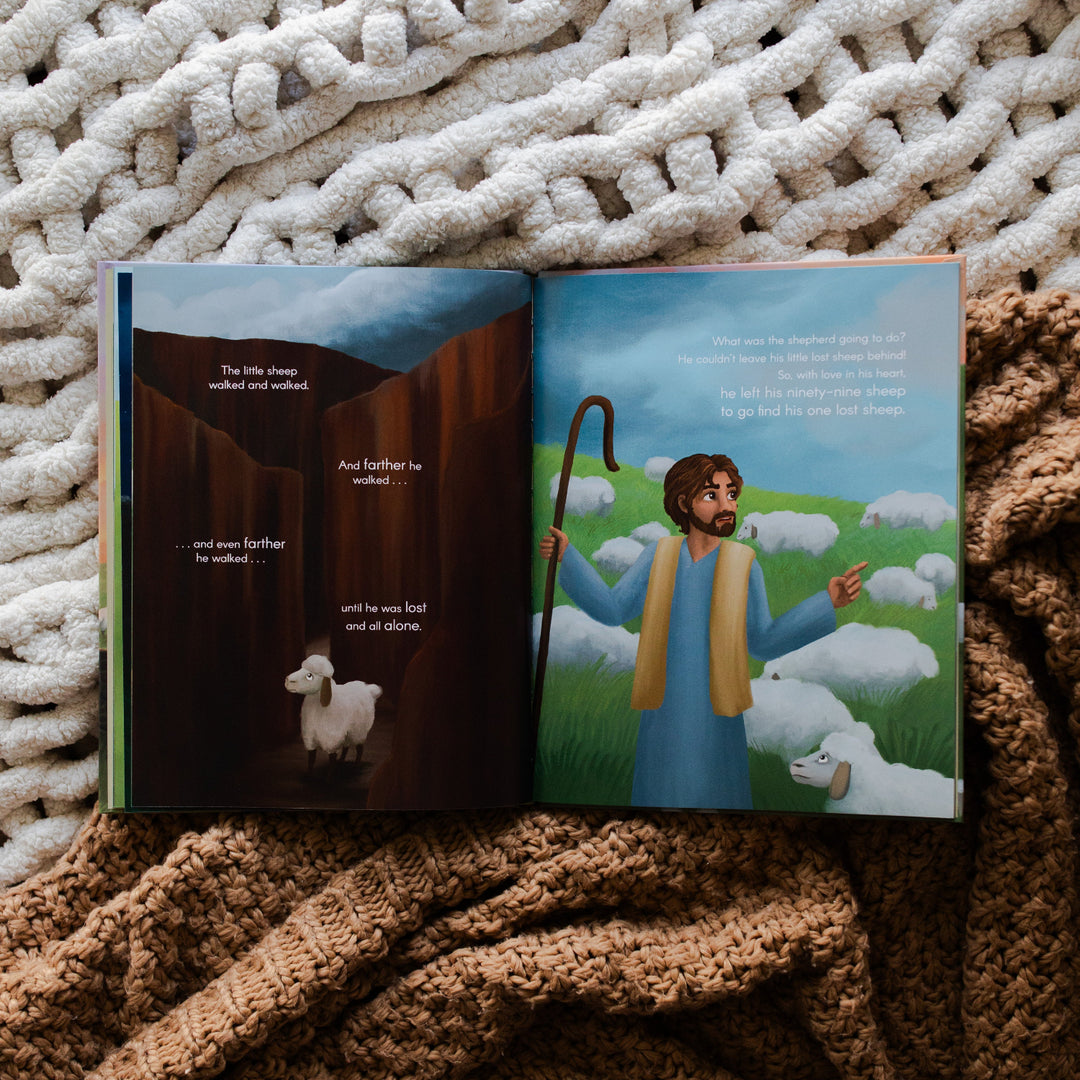 The Story of the Lost Sheep Book page of a sheep alone with walls around it and the other page of a man counting sheep; the book is on two blankets, one cream colored and one brown