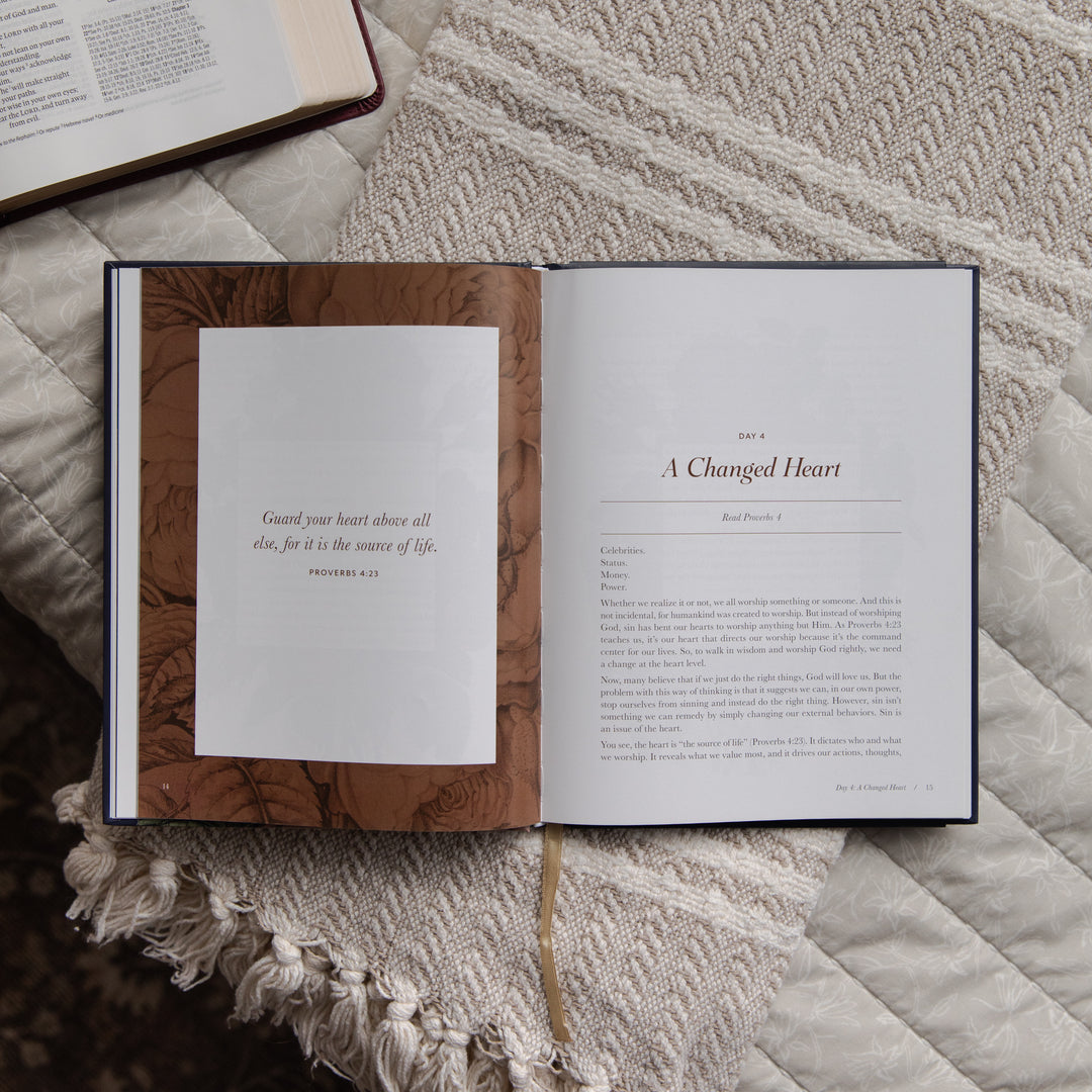 Open devotional on a textured surface