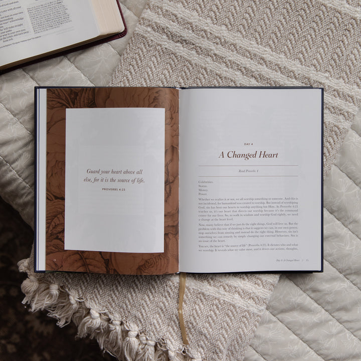 Open devotional on a textured surface