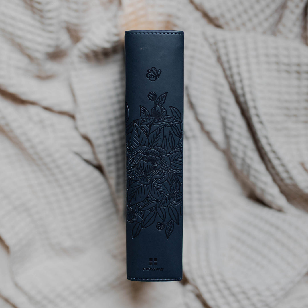 Binding image of the navy blue ESV Bible with floral design