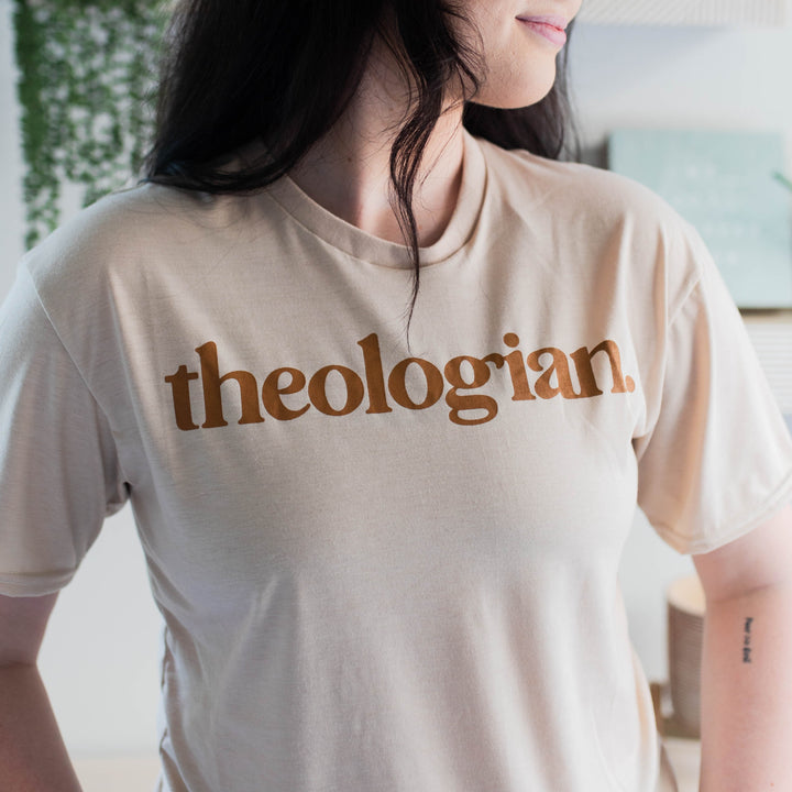 woman wearing theologian tee shirt