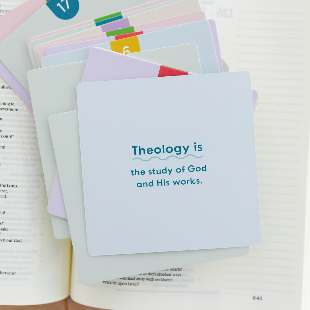 stack of cards with top one showing definition of Theology