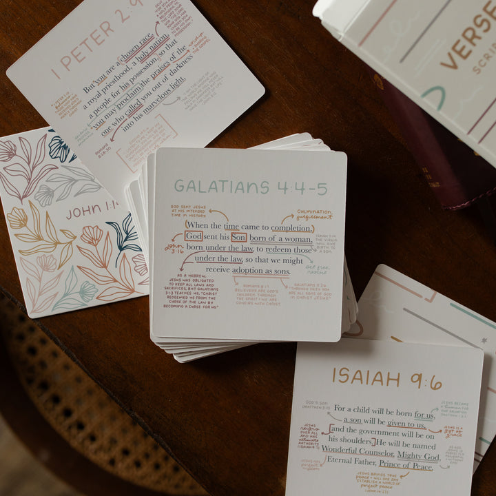 Multiple stacks of the Verse Map Scripture cards on a wooden table