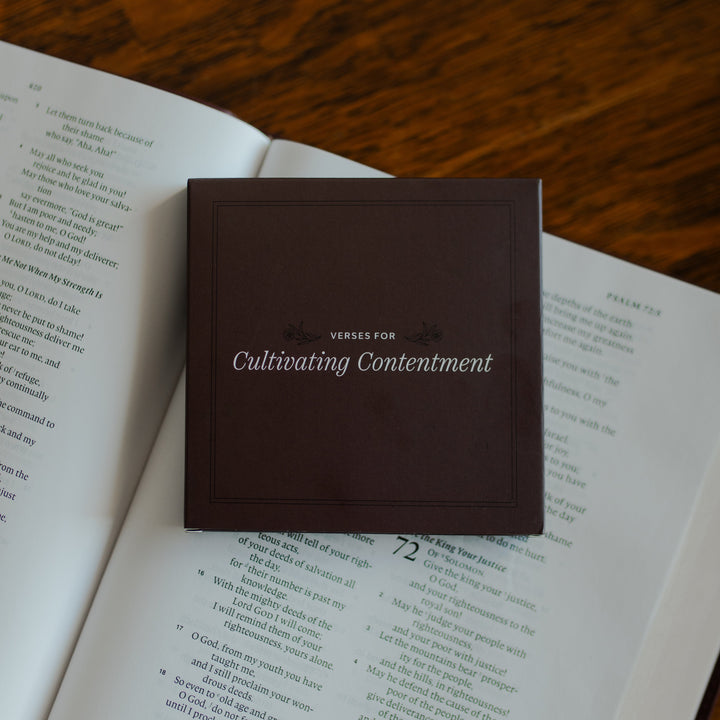 Verses for Cultivating Contentment verse card box on an open bible