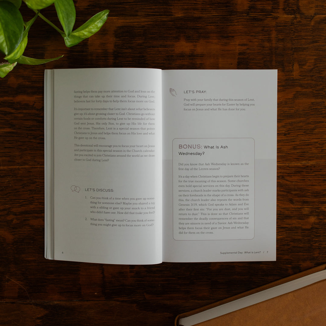 Walking with Jesus Study opened to the Prayer and Discussion page on a wooden table near some greenery and a closed journal
