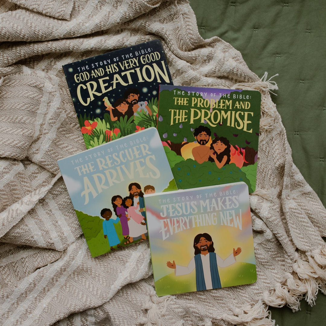 All four of the Story of the Bible books on a blanket