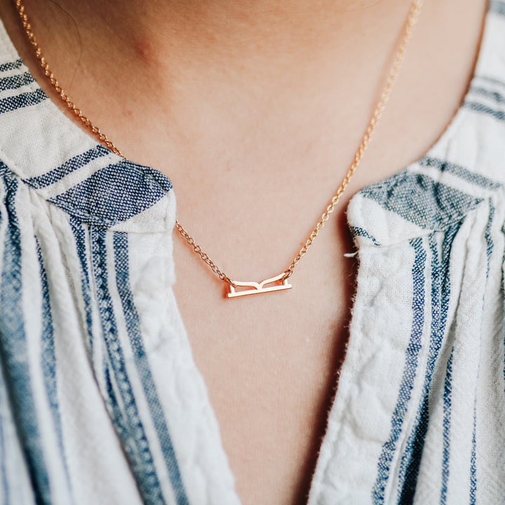 christian necklace with shape of open bible