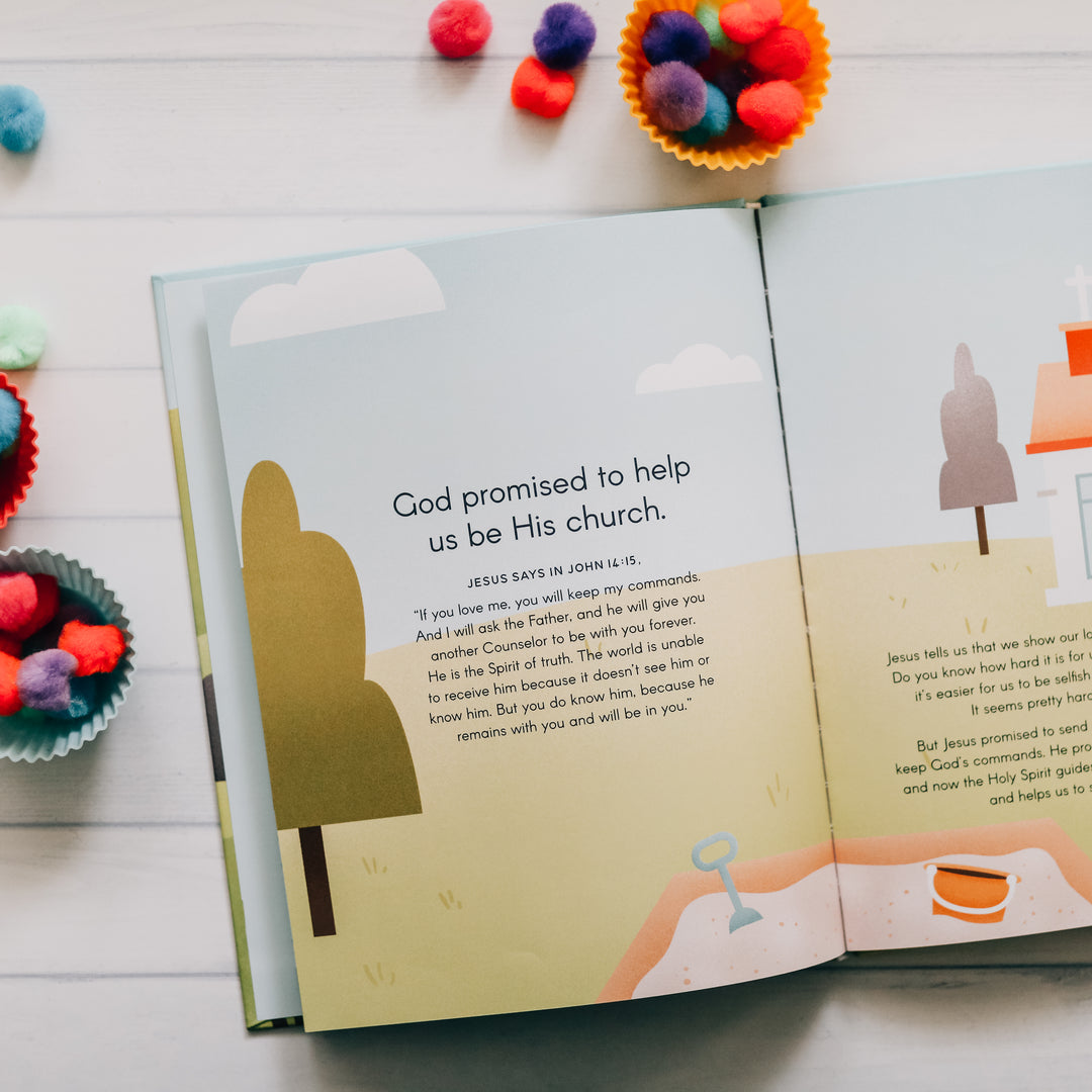 Children's book opened to written words with craft supplies surrounding it