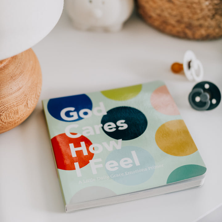 Emotions board book for kids displayed on side table