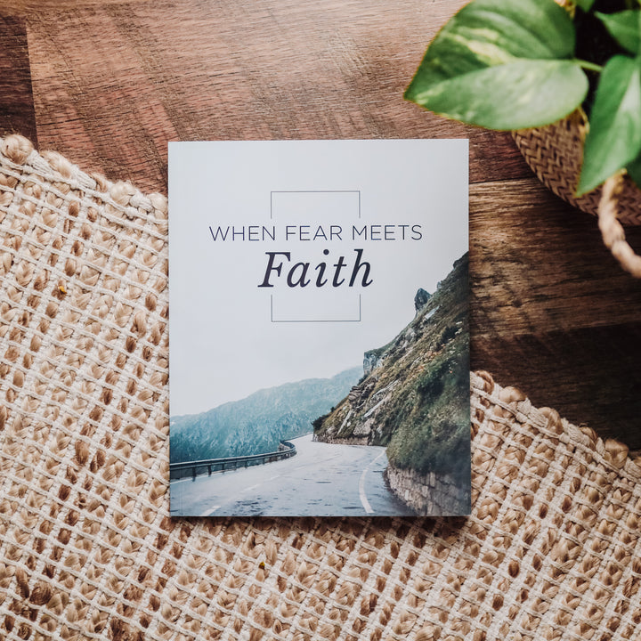 Men's Bible Study on fear sitting on floor by plant