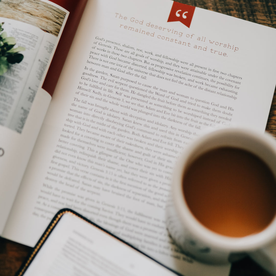 Men's Bible Study on worship sitting open with mug on it