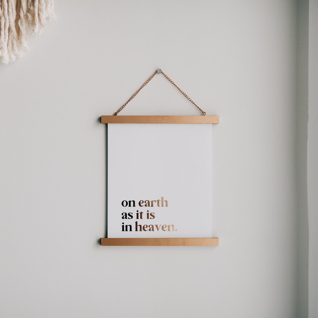 Print with gold foil that reads "on earth as it is in heaven"