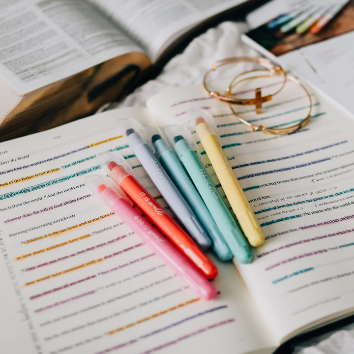 Six pastel highlighters with encouraging phrases