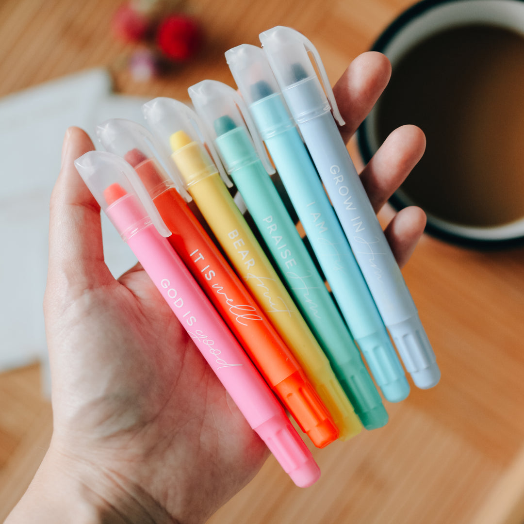 Six pastel highlighters with encouraging phrases