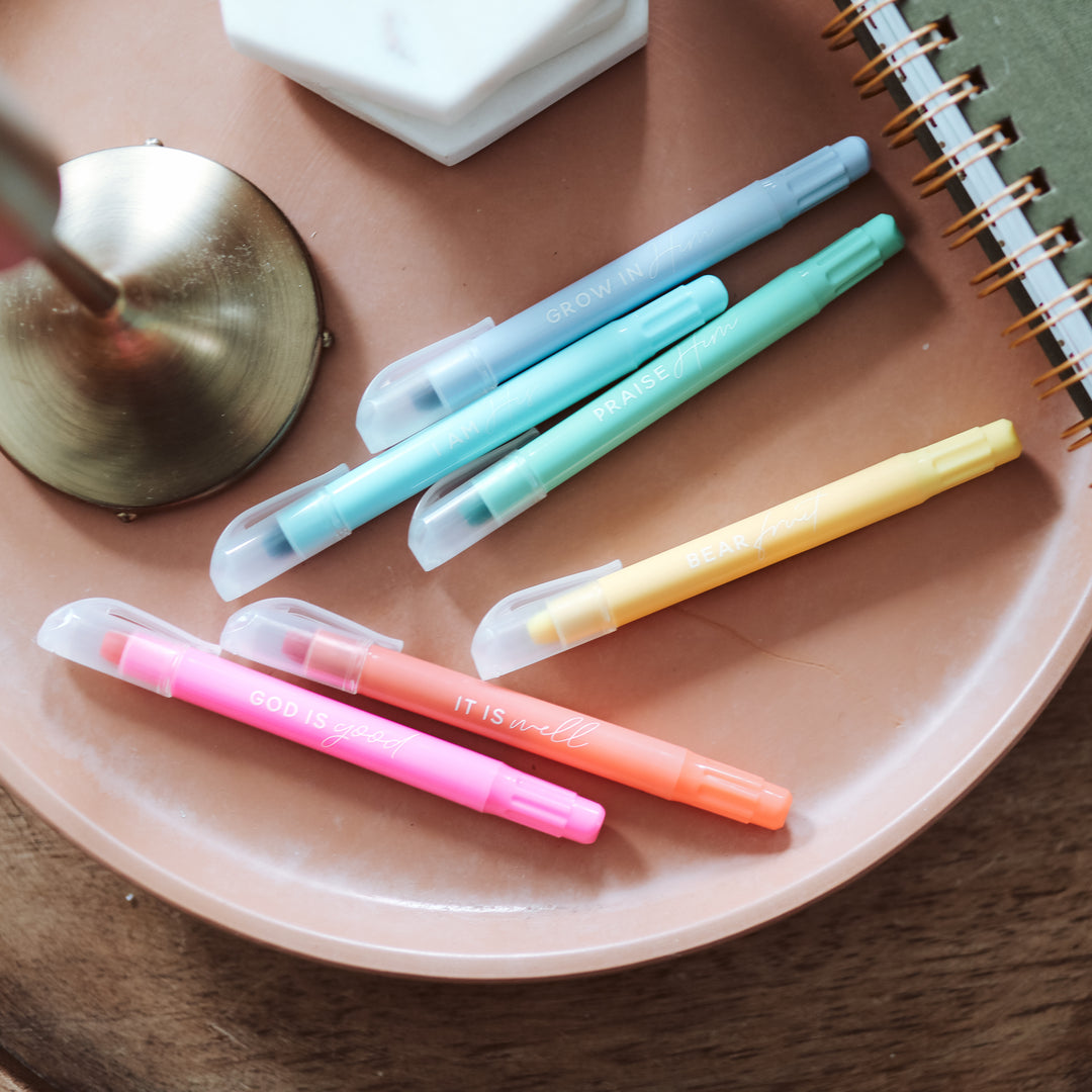 Six pastel highlighters with encouraging phrases