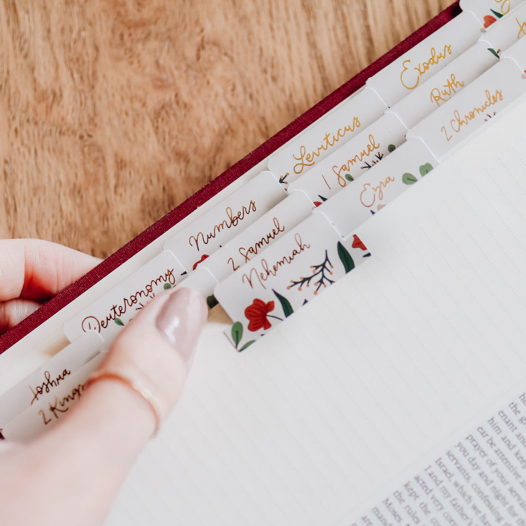 Close up with open Bible that has Rust Floral Bible Tabs.