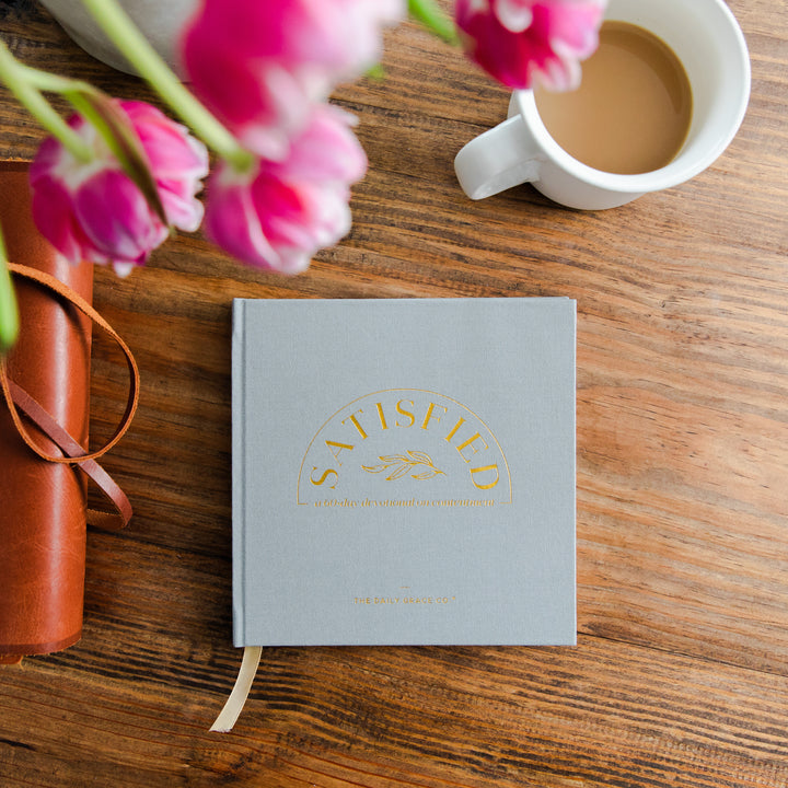 Satisfied: A 60-Day Devotional: front pastel, linen cover with gold foil text