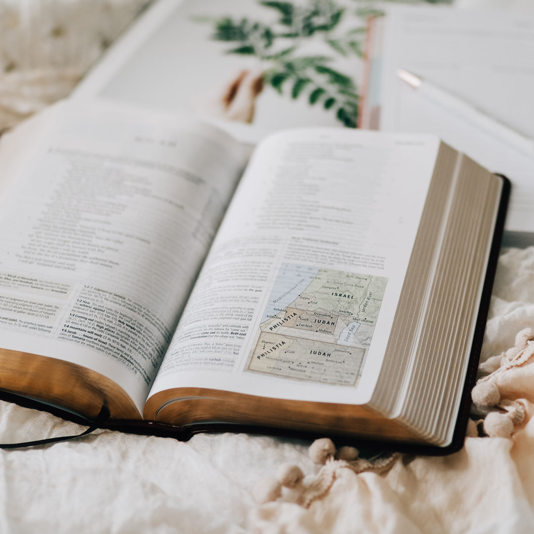 open bible on bed