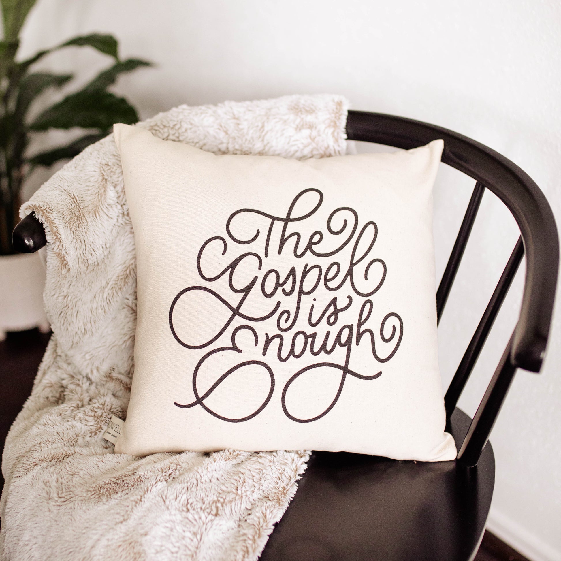 https://thedailygraceco.com/cdn/shop/products/TheGospelisEnoughPillow4266_3.jpg?v=1655923351&width=1946