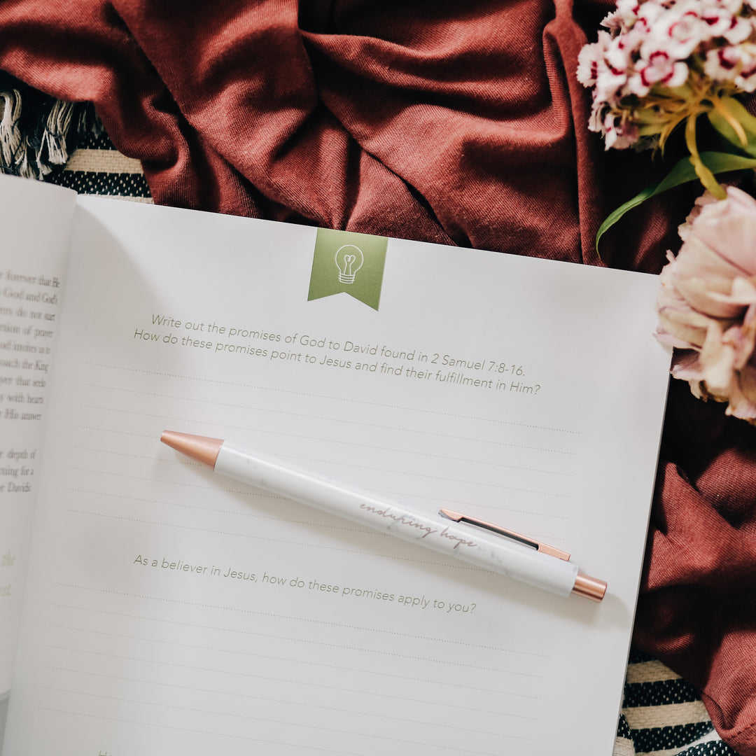 women's Bible Study on worship with pen on top of it