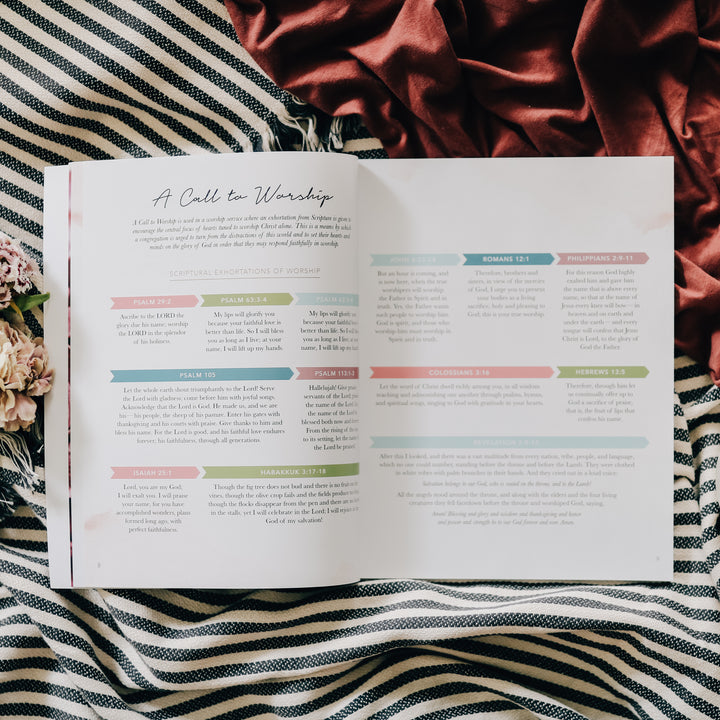 women's Bible Study on worship sitting open on blanket